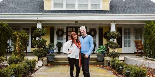 Billy and Jacqui Mann standing outside in front of the Inn