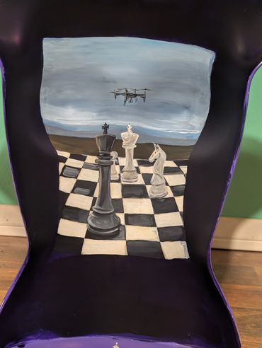 Painting of chess pieces and a drone on a checkered board inside a chair frame.