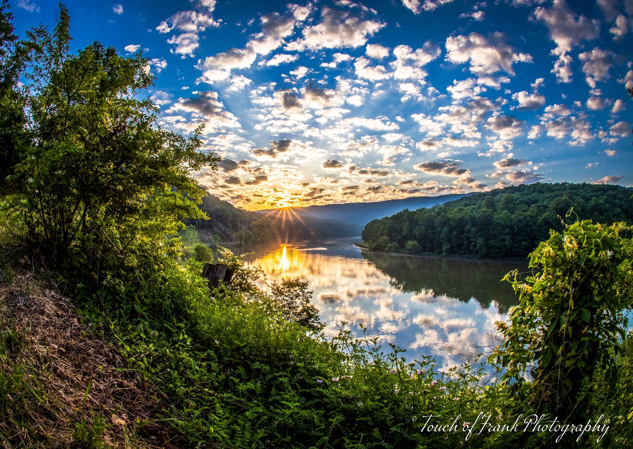 Sunrise reflecting off of the southern end of Raystown Lake, at Weavers Falls Access area.