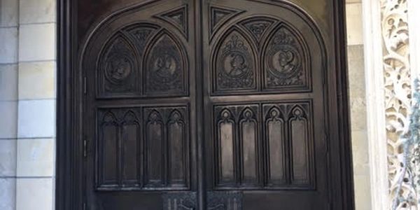 Sun damaged Decorative front doors.