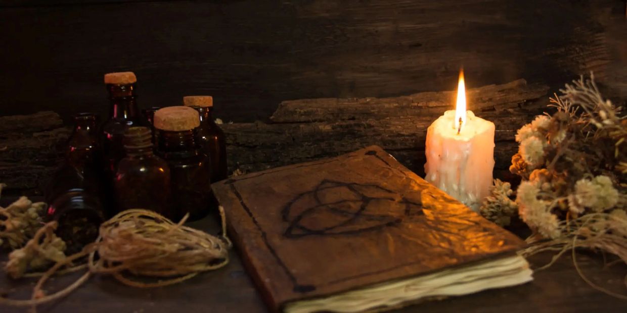 Handcrafted custom spellcasting and candle ritual on altar
