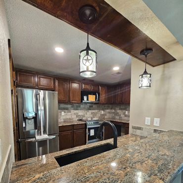 New Update Kitchen, Update Cabinets with new stain, New Backsplash, Countertops, New Tile Flooring