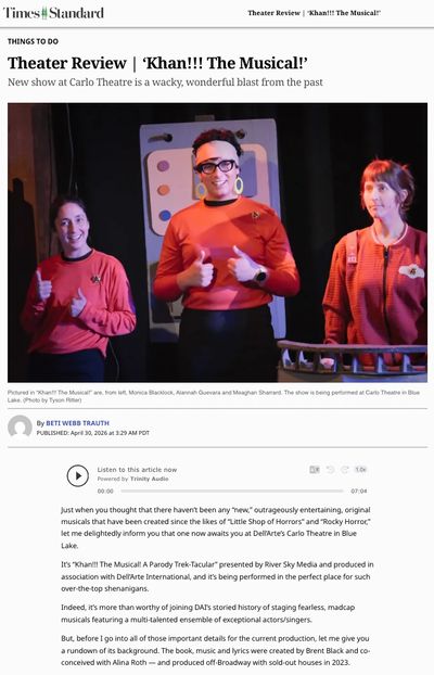 Three actors in Star Trek-inspired costumes perform on stage.
