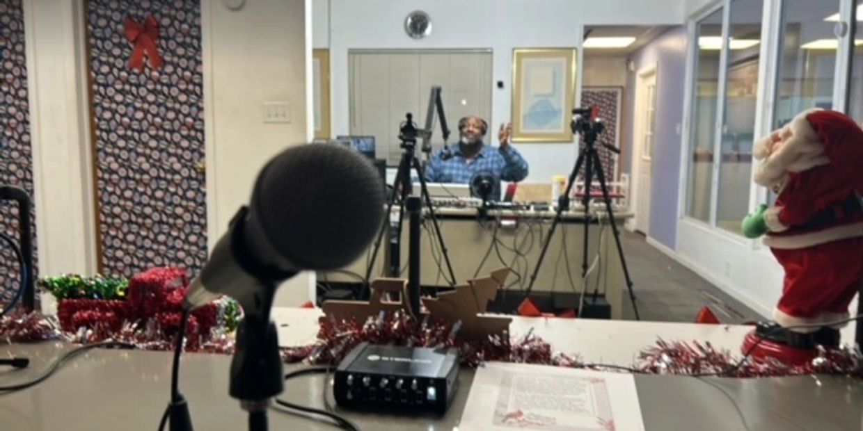 Microphone and recording setup with a person in the background.