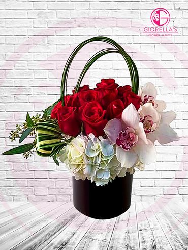 Stunning arrangement with
Dozen of Roses hydrangeas, 
and Cymbidiums