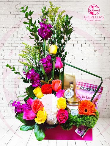 Wooden  vase with Passion Candle, chocolates, cheesecake bites, Roses, hydrangeas, stock, solidago