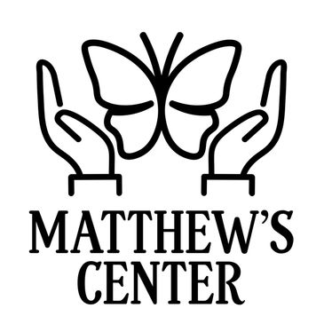 Logo with hands holding a butterfly and text 'Matthew's Center'.