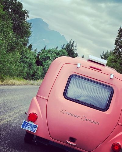 Meet Dotty, our vibrant pink custom camper ready to roll into action!  Health hub on wheels! 