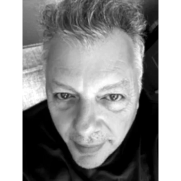 Black-and-white close-up portrait of Lee Elliott from the band Blue Cartoon.  