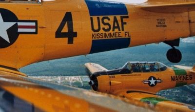 Two T-6 Texan WWII Trainers flying tandem over the skies in Central Florida