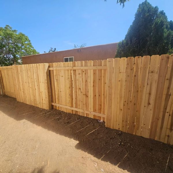 Cedar Fence Installation in Albuquerque, New Mexico. 