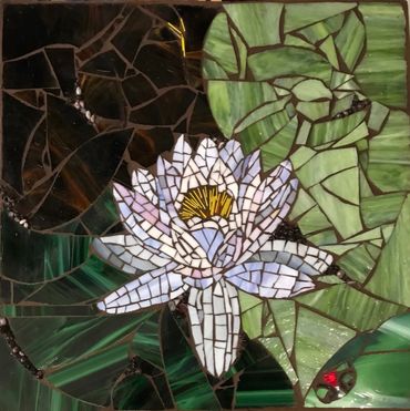 A Water Lily Mosaic Art With Green Background