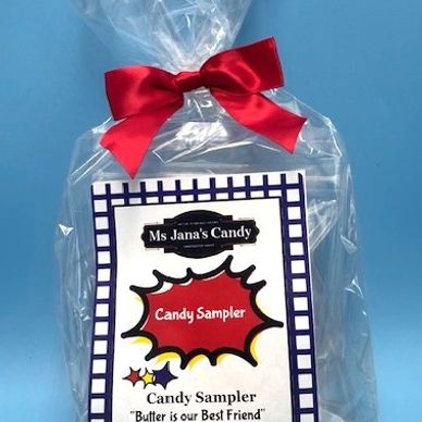 Packaged candy sampler with red bow and colorful label.
