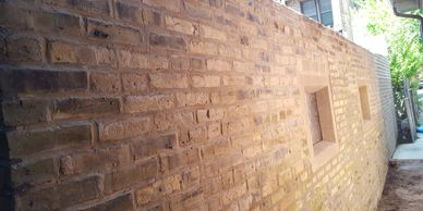 Tuckpointed brick wall