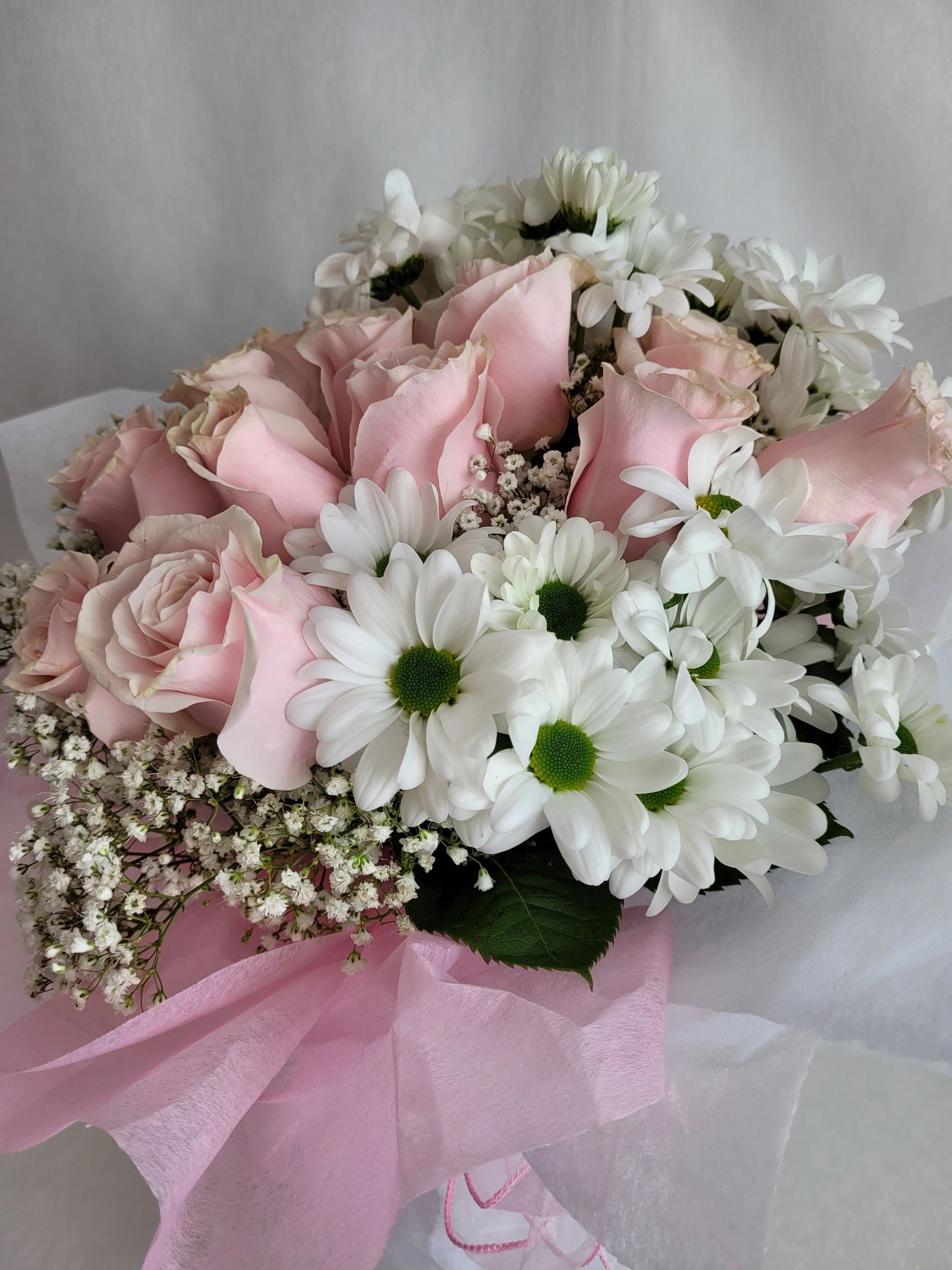 Pink roses and white mums floral arrangement