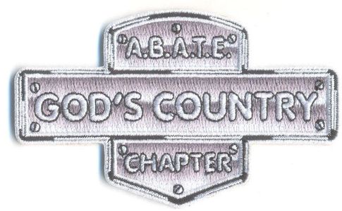 Embroidered patch with text 'A.B.A.T.E. God's Country Chapter'.