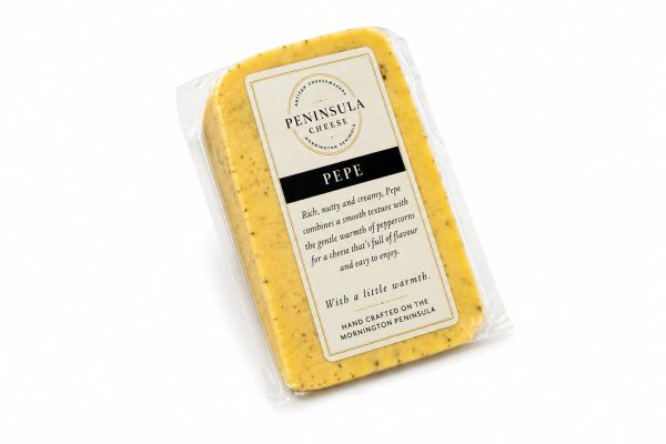 Packaged Peninsula Cheese Pepe with peppercorns.