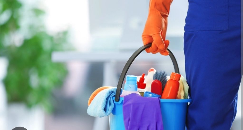 Cleaning bucket full of supplies.