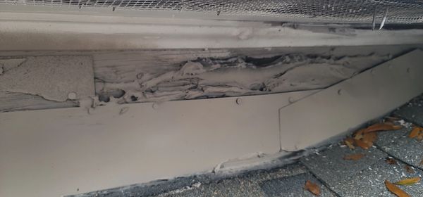 A horrible fix job with caulking, from the attic you could see right out.  