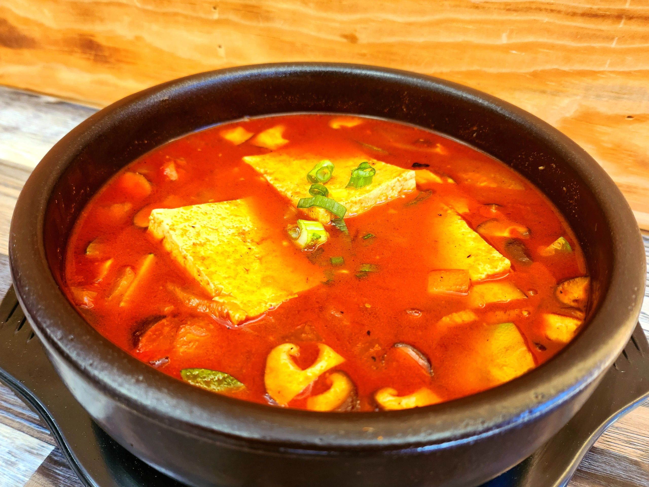 Spicy Tofu Stew  with Pork Belly or Sausages. 