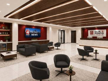 Modern and cozy news station lobby with seating areas.