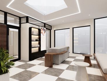 Modern spa reception area with sleek design and natural lighting.