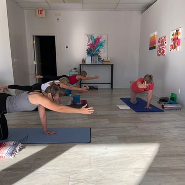 Group of people doing yoga