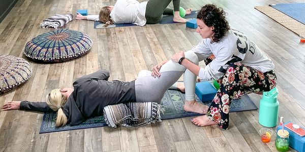 An assisted stretch group session