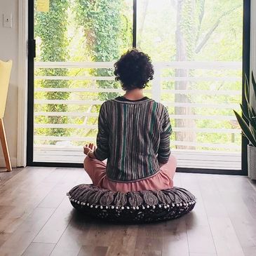 A girl meditating.