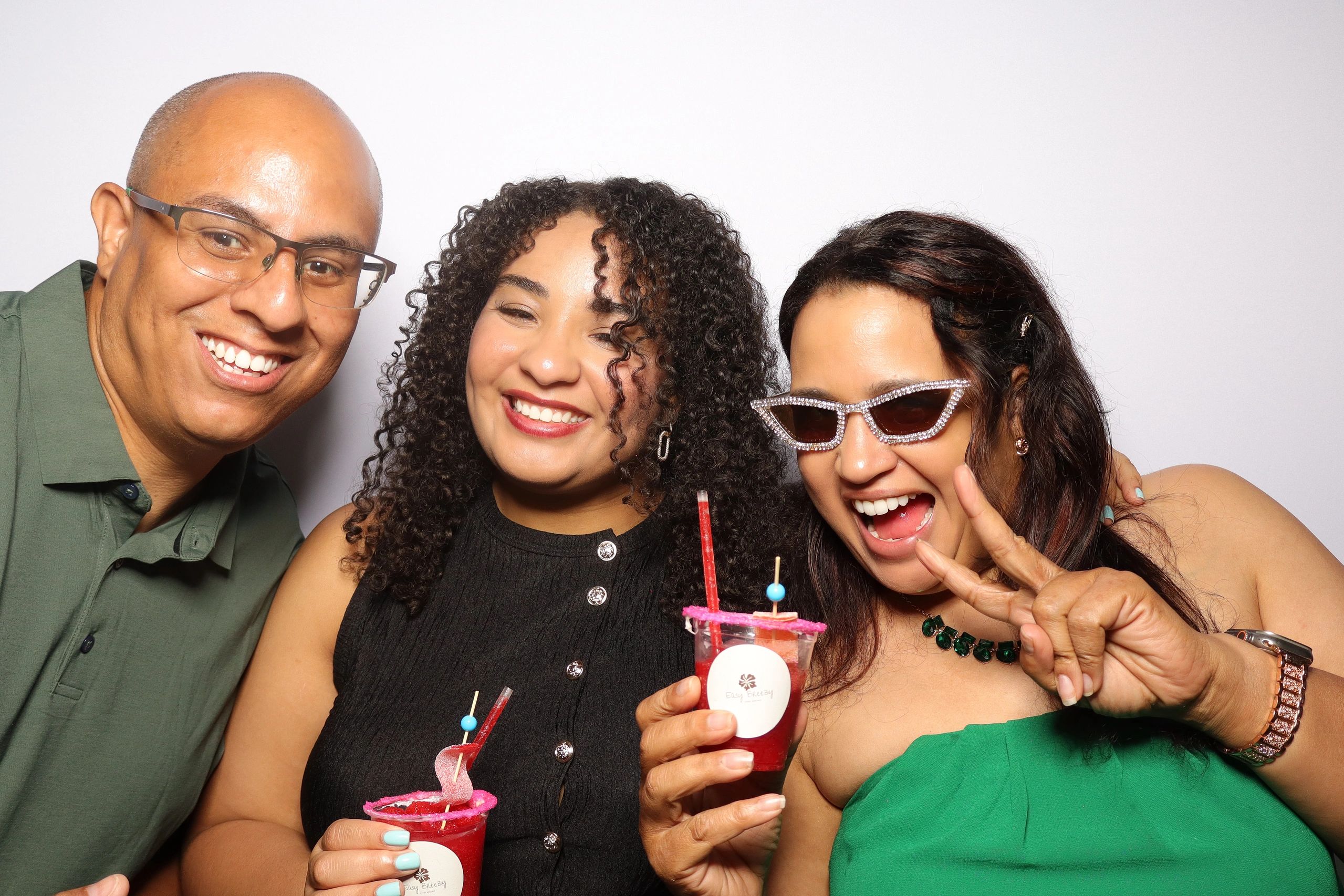 Family taking a photo at a Sweet 16 Birthday party