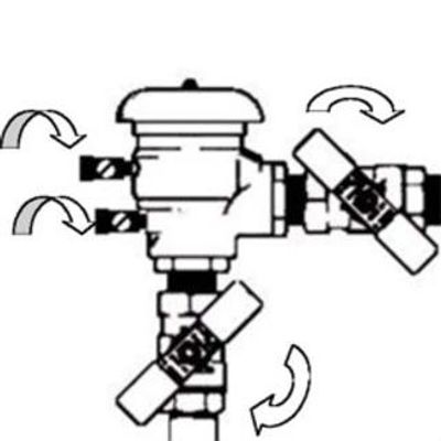 Diagram showing valve and pipe connections with directional arrows for flow control.