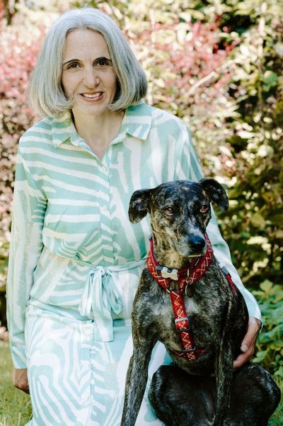 Dr Caroline Allen FRCVS vet and founder of Pet Lighthouse with her dog, Jess.