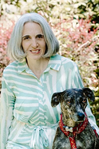 Dr Caroline Allen MA VetMB CertSAM FRCVS with her Bull Lurcher dog, Jess.