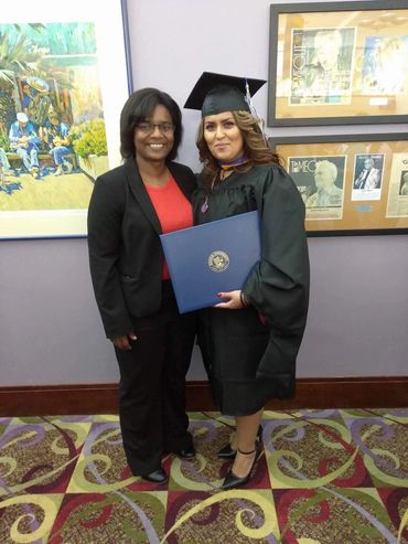 A image of graduates and Dr.Presley 
