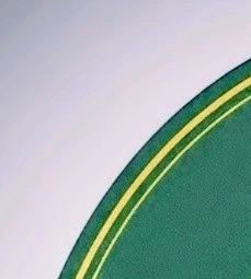 Close-up of a green surface with yellow lines.