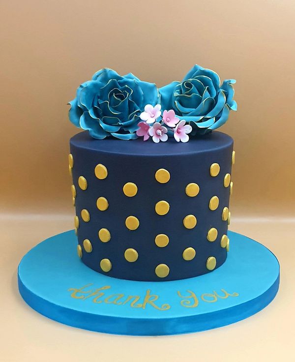 navy blue cake teal roses gold spots