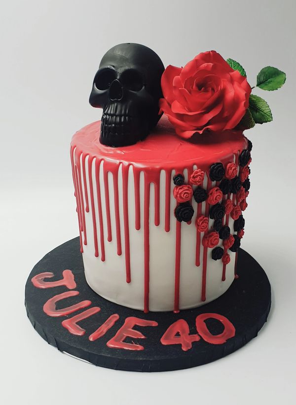 skull and rose drip cake