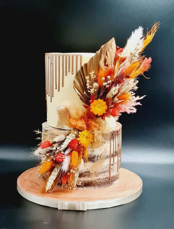 dried flowes bunch semi naked drip cake 2 tier