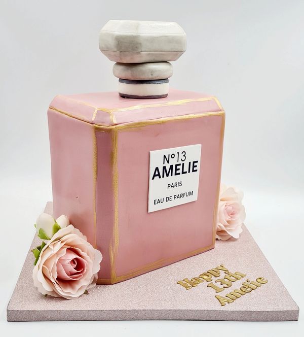 coco chanel no5 bottle cake with roses