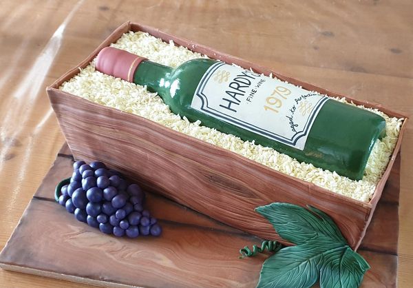 wine bottle in case cake