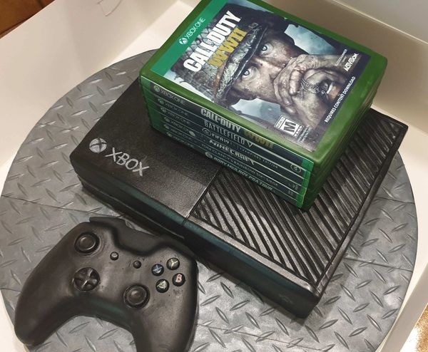 xbox cake with games and controller cake