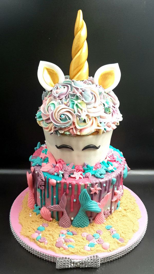 2 tier unicorn and mermaid drip cake