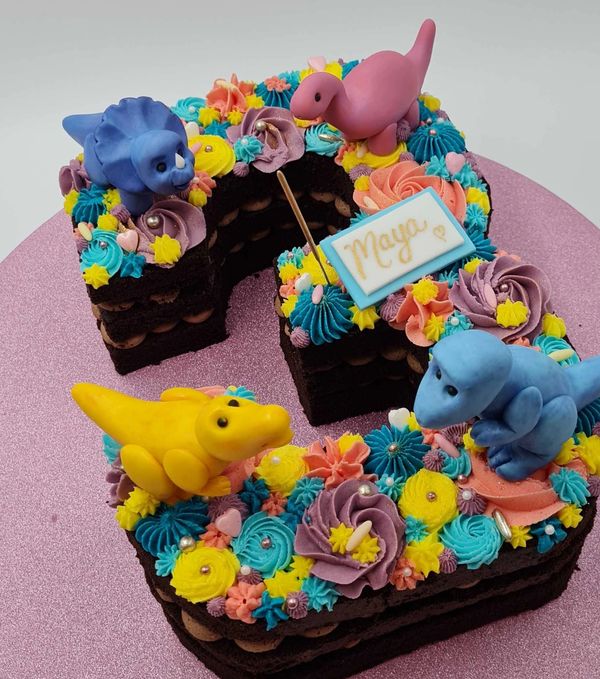 number 3 cake in a dinosuar theme