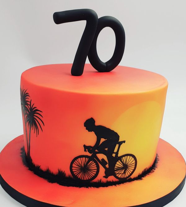 CYCLING silhouette cake in sunset