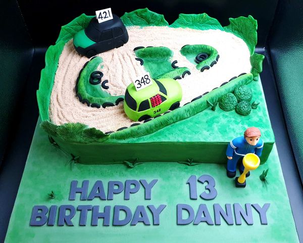 banger racing racetrack and cars cake