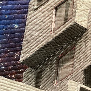 Custom printed fabric. Encrusted in crystal stars.