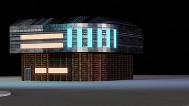 Futuristic building with glowing blue and yellow lights against a dark background.