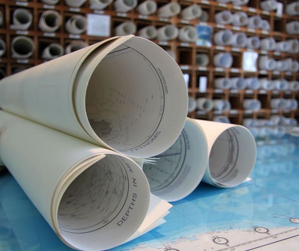 Chart table and chart bins at Seabreeze
