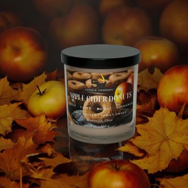 Bring the cozy warmth of fall indoors with this 9-ounce Apple Cider Donuts candle. Infused with the 