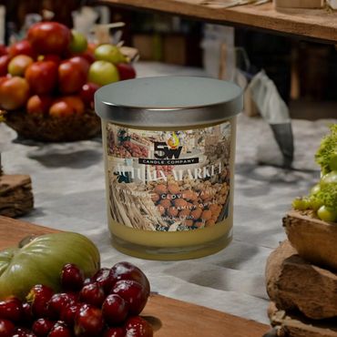 Embrace the cozy warmth of fall with our Autumn Market 9 ounce candle. Infused with rich notes of ci